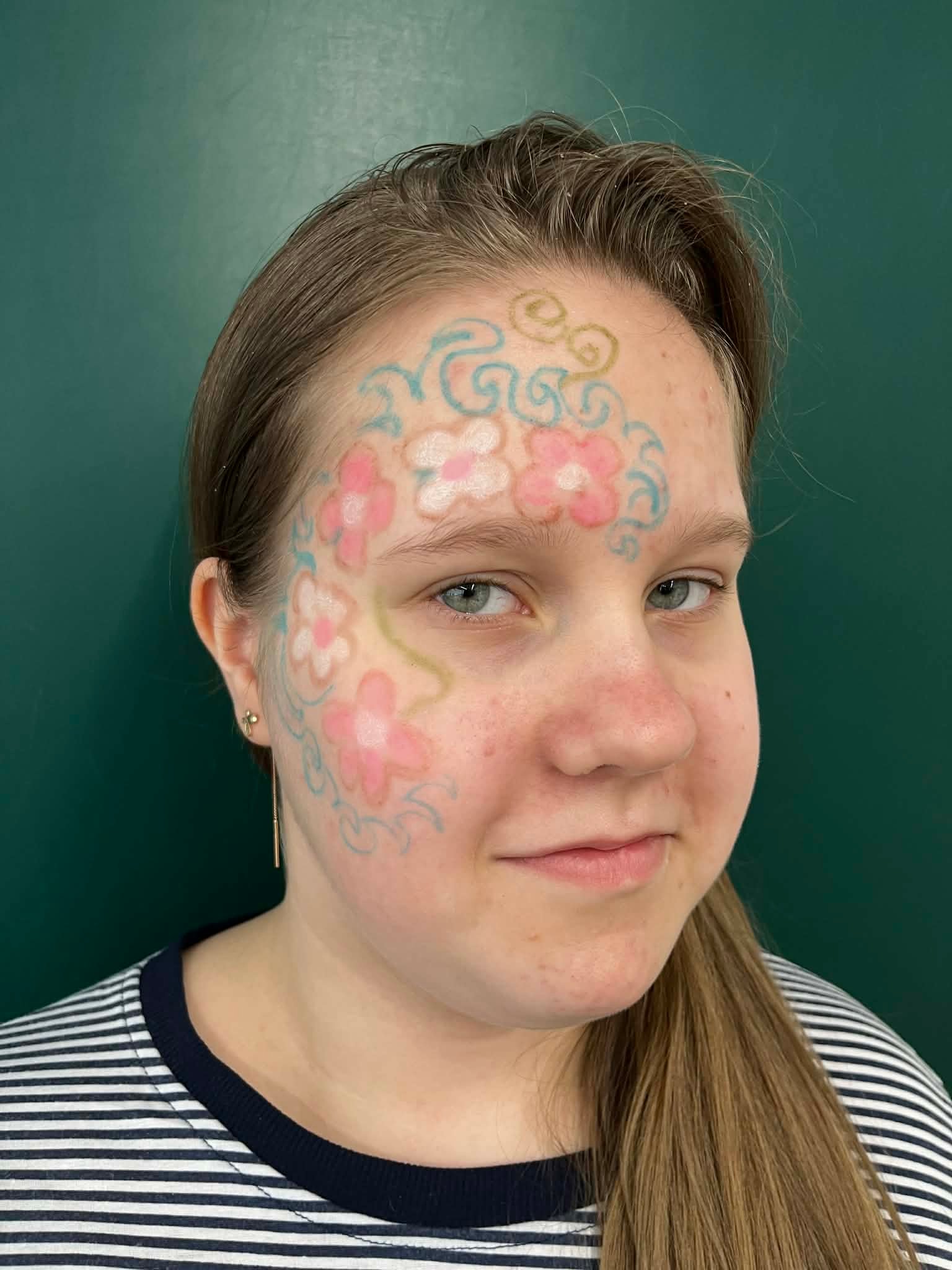 Face with colorful decor